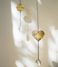 Surya Engraved suncatcher - eye heart